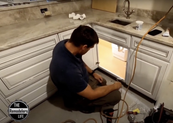 Building contractor, plumber uses a small, but powerful drain pump to overcome a big plumbing challenge